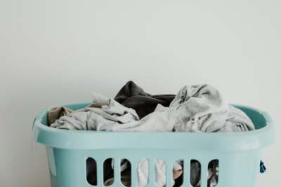 Laundry basket with clothes in