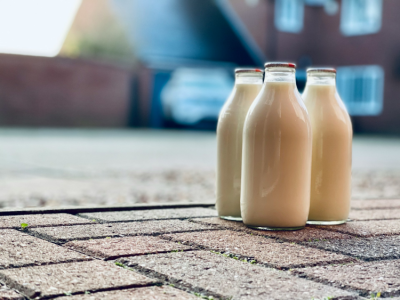 Three bottles of milk on doorstep 