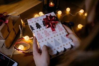 Book wrapped in Christmas paper