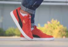 Pair of red Puma trainers