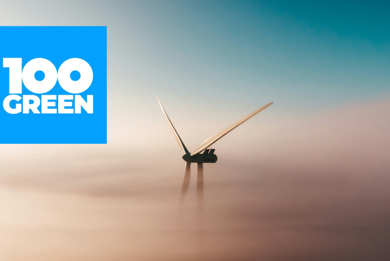 Wind turbine in mist with 100Green logo 