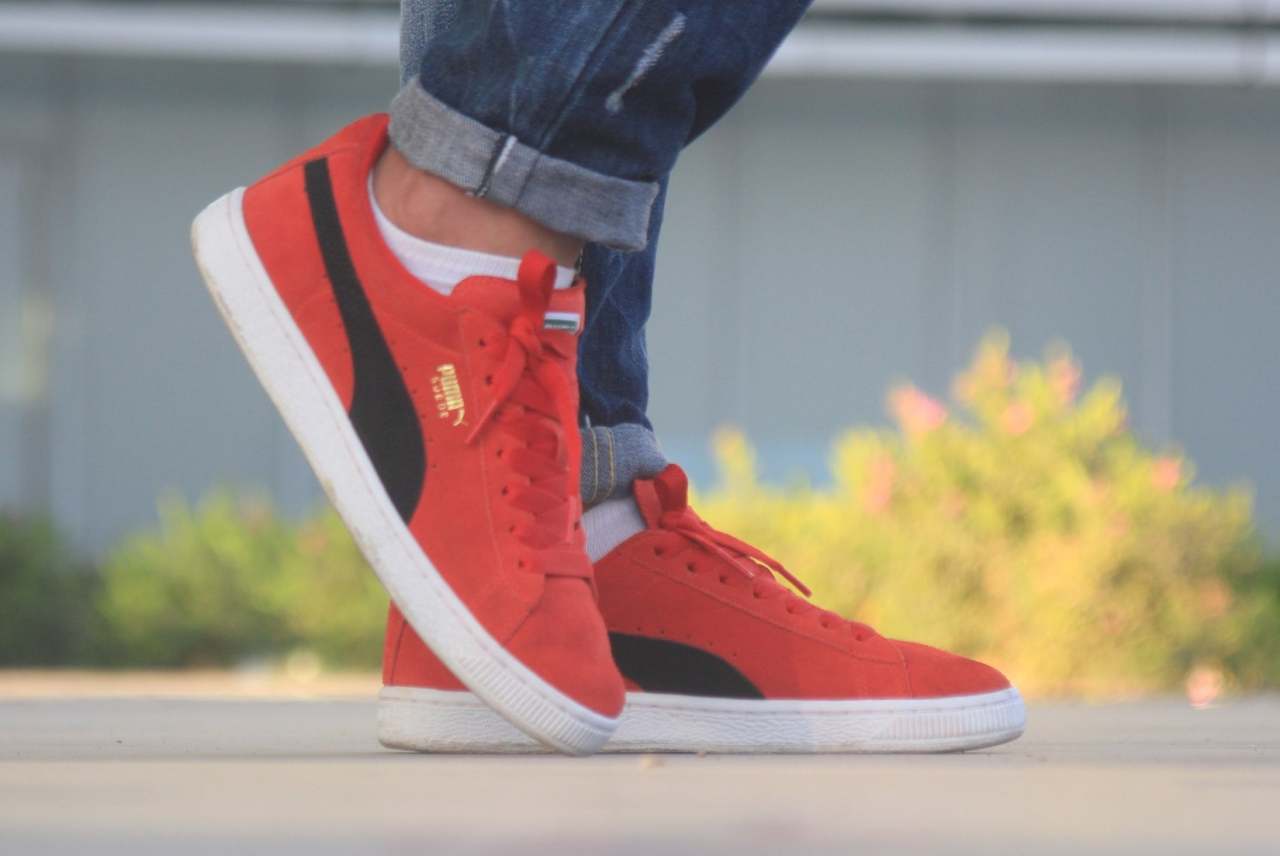Pair of red Puma trainers