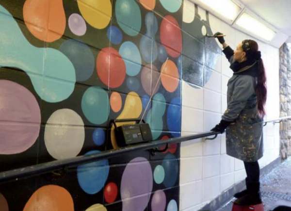 Image: bradford mural a local artist painting a mural in the jacobs well subway in bradford community repaint ethical consumer